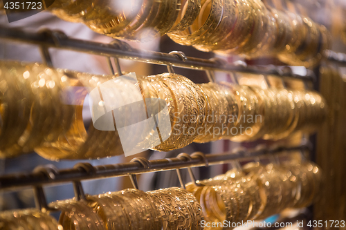 Image of gold jewelry in the shop window