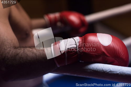 Image of kick boxer with a focus on the gloves