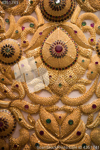 Image of gold jewelry in the shop window