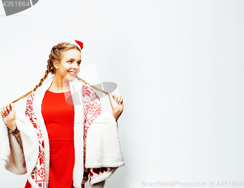 Image of young pretty happy smiling blond woman on christmas in santas re