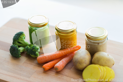 Image of vegetable puree or baby food in glass jars