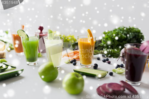 Image of glasses with different fruit or vegetable juices