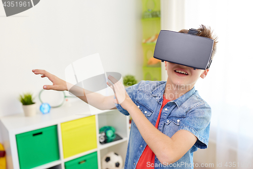 Image of boy in virtual reality headset or 3d glasses