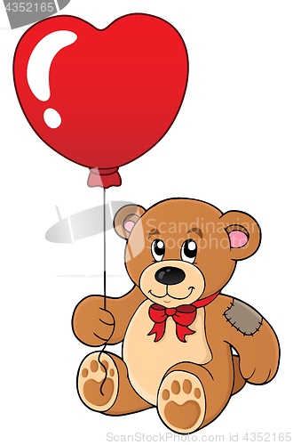 Image of Teddy bear with heart shaped balloon