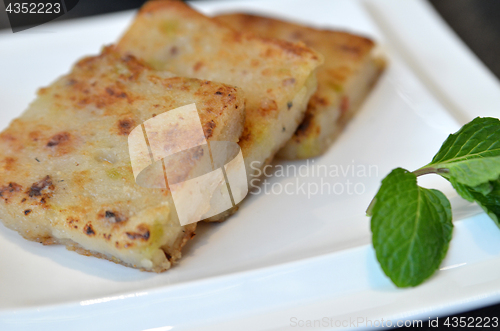 Image of Fried carrot cake on white plate 