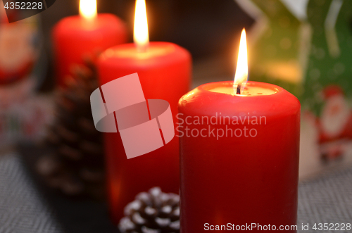 Image of Christmas candle burning at night