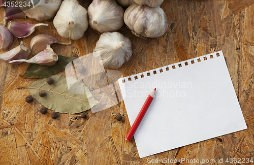 Image of blank with pensil on wooden surface