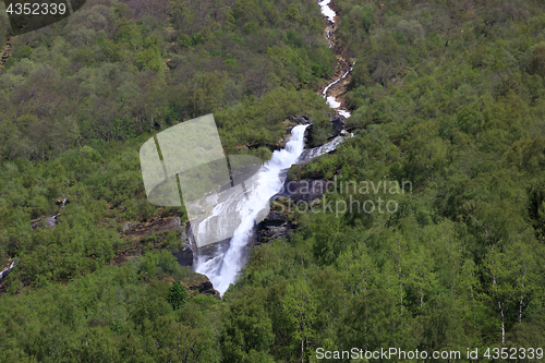 Image of The snow melting creates streams along the mountainside west of 