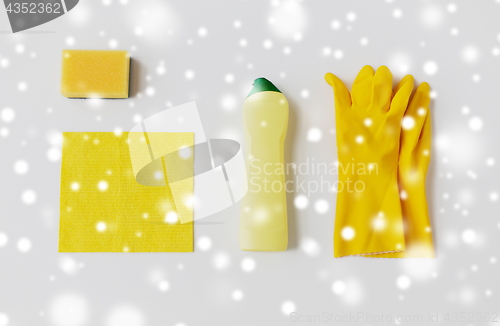 Image of detergent with cleaning stuff on white background