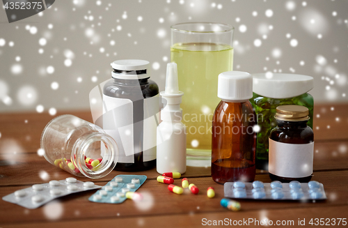 Image of medicine and drugs on wooden table