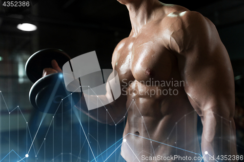 Image of close up of man with dumbbells exercising in gym
