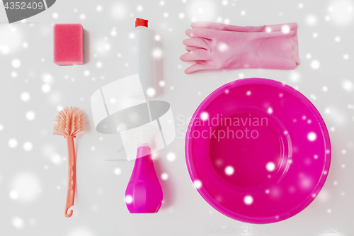 Image of basin with cleaning stuff on white background