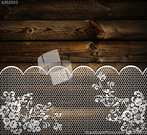 Image of wooden background with lace