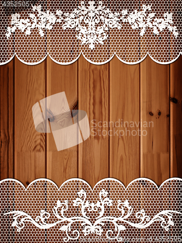 Image of wooden background with lace frame