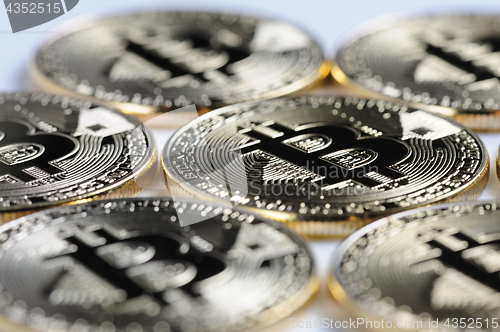 Image of Macro view of shiny Bitcoin souvenire coins