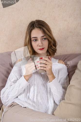 Image of Girl with a cup of coffee