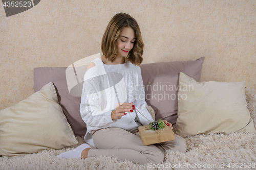 Image of The girl on the couch