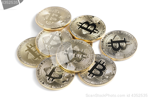 Image of Shiny Bitcoin souvenire coins row isolated