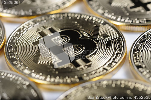 Image of Macro view of shiny Bitcoin souvenire coins