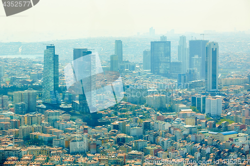 Image of Istanbul, Turkey - 1 April, 2017: Urban landscape of European side of Istanbul and Bosphorus Strait on a horizon. Modern part of city with business towers of international corporations, skyscrapers an