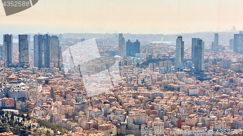 Image of Istanbul, Turkey - 1 April, 2017: Urban landscape of European side of Istanbul and Bosphorus Strait on a horizon. Modern part of city with business towers of international corporations, skyscrapers an