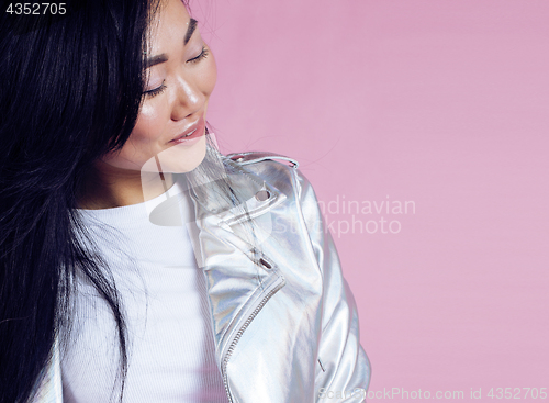Image of young pretty stylish hipster asian girl posing emotional isolated on pink background happy smiling cool smile, lifestyle people concept 