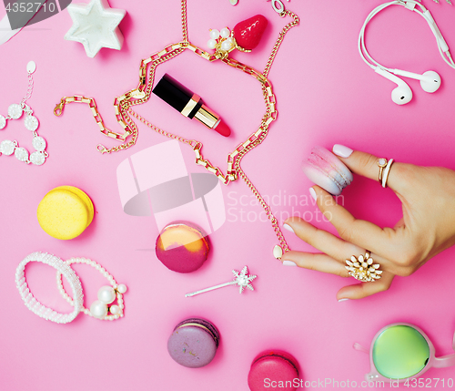 Image of Jewelry table with lot of girl stuff on it, little mess in cosmetic brushes, women interior concept, perfume elegance things, little princess makeup 