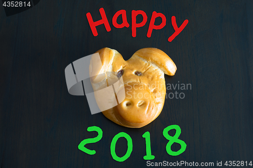 Image of baked lucky pig as talisman for new year 2018