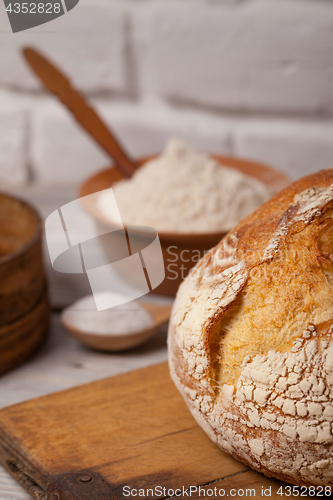 Image of Homemade bread on old cutting board