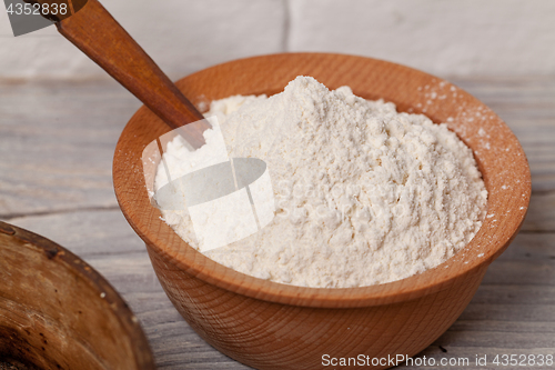 Image of Wheat flour in wooden bowl