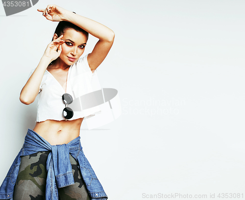 Image of young pretty stylish hipster girl posing emotional isolated on w