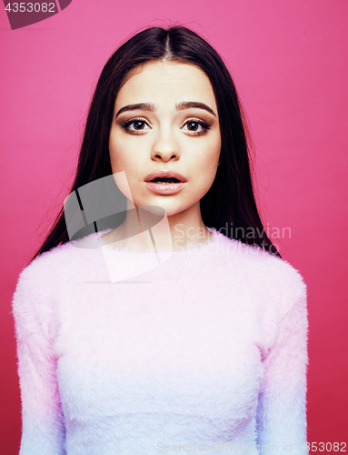 Image of young pretty brunette girl posing on pink background, lifestyle people happy smiling concept close up