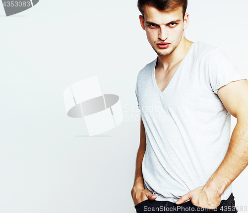 Image of young handsome teenage hipster guy posing emotional, happy smiling against white background isolated, lifestyle people concept closeup