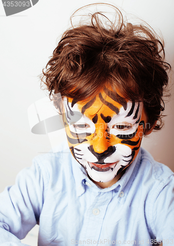 Image of little cute boy with faceart on birthday party close up, little 