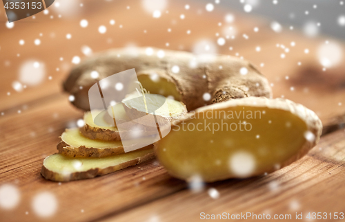 Image of close up of ginger root on wooden table