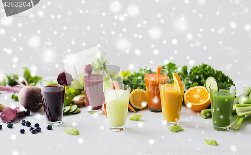 Image of glasses with different fruit or vegetable juices