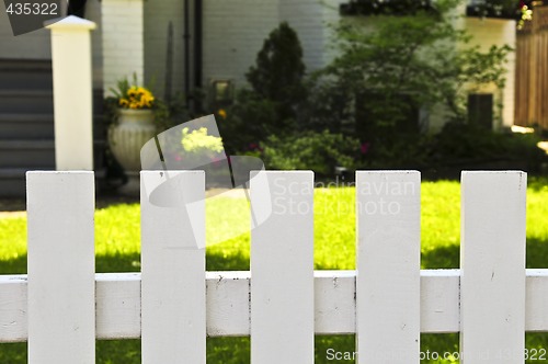 Image of Front yard with white fence