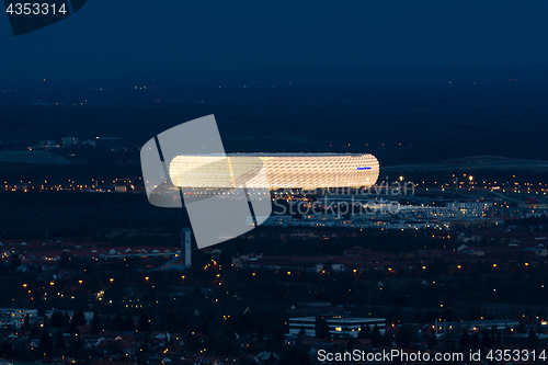 Image of Night aerial view of exterior football stadium Allianz Arena