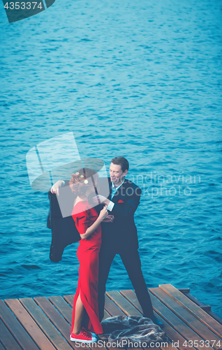 Image of Beautiful Couple On The Background Of Water