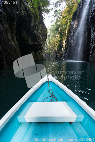 Image of Small boat travel in Takachiho gorge