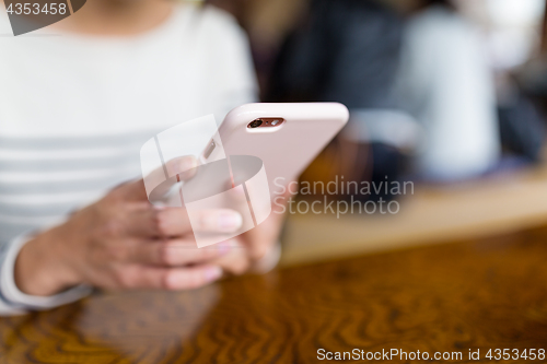 Image of Woman using mobile phone