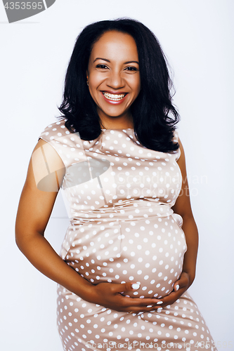 Image of young pretty african american woman pregnant happy smiling, posing on white background isolated , lifestyle people concept