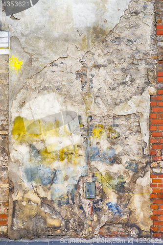 Image of colorful painted abandoned brick wall background