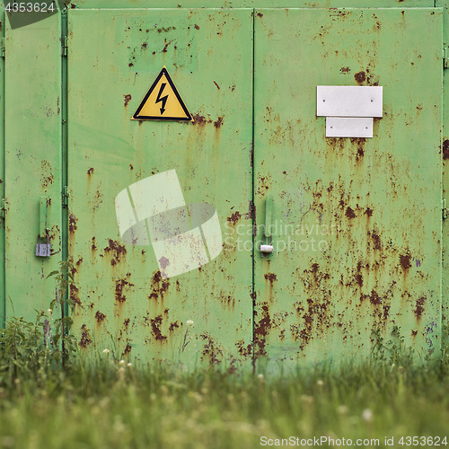 Image of Metal rusty green door