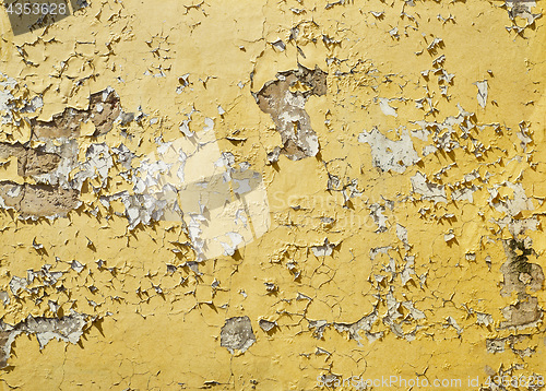 Image of Yellow painted stucco wall