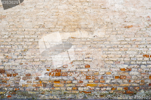 Image of abandoned grunge cracked brick stucco wall background