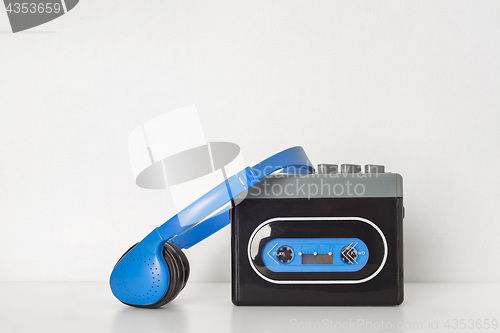 Image of Retro walkman and headphones on the shelf