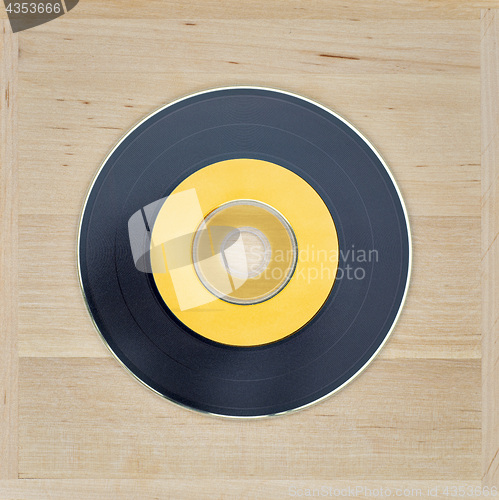 Image of Black and yellow cd looks like vinyl