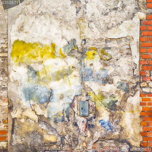 Image of colorful painted abandoned brick wall background