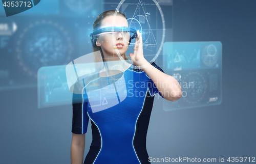 Image of woman in virtual reality 3d glasses with charts